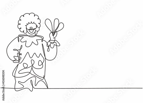 Single continuous line drawing of young funny male clown holding juggler before perform at show. Professional work job occupation. Minimalism concept one line draw graphic design vector illustration