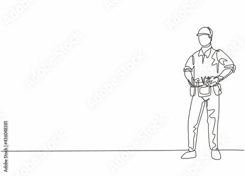 Continuous one line drawing of young handsome handyman pose standing before go to work. Professional job profession minimalist concept. Single line draw design vector graphic illustration