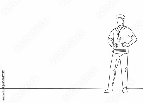 Single continuous line drawing of young handsome sailor man pose standing on cruise ship. Professional work job occupation. Minimalism concept one line draw graphic design vector illustration