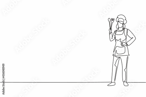 Continuous one line drawing of young beautiful female chef standing with hands on hip. Professional job profession minimalist concept. Single line draw design vector graphic illustration