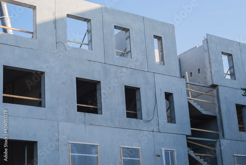 House under construction. Prefabricated building elements. Cement.