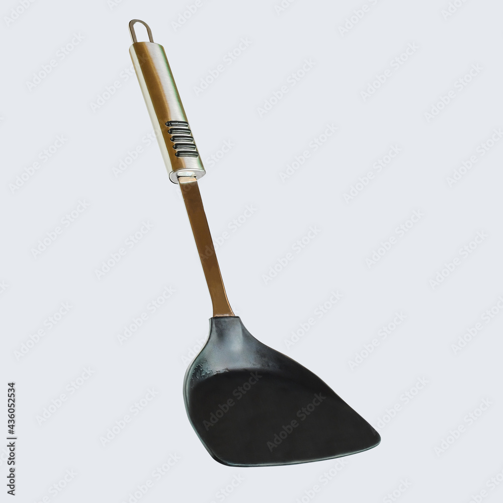 A flipper used in frying a food at asian cooking.