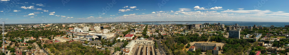 Panorana of center city with sea port background in Odessa Ukraine. Drone footage, morning time..