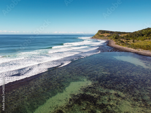 Aerial view of Lenox Reef and Lennox Point surf spots in Lennox Head, New South Wales, Australia