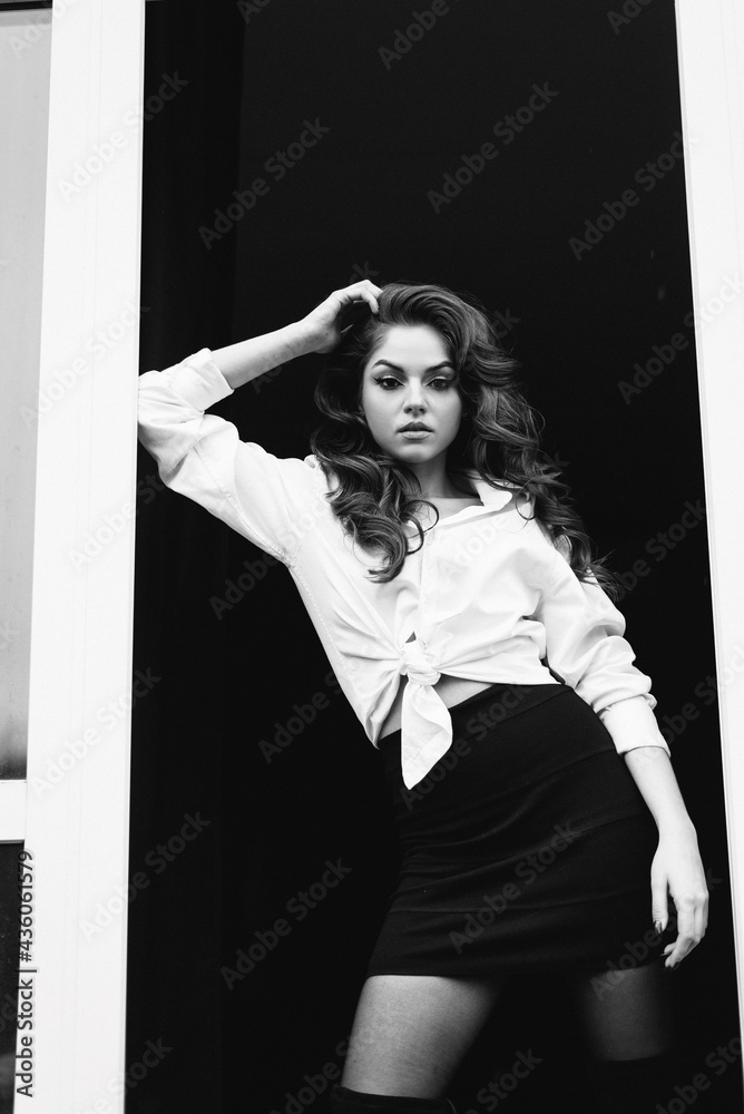 Fototapeta premium Beautiful thoughtful young european woman portrait at studio