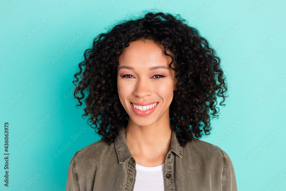 Portrait of attractive cheerful wavy-haired girl wearing cozy shirt good mood isolated over bright blue color background Portrait of attractive cheerful wavy-haired girl wearing cozy shirt good mood isolated over bright blue color background