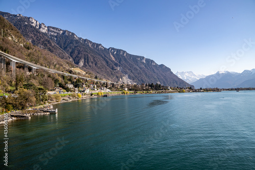 Montreux, Switzerland 04.04.2021 - View from Chillon Castle Chillon Viaduct, Lake Geneva and the Alps in the background