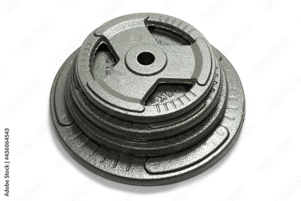 Weight plates isolated on a white background. Weight plates isolated on a white background.