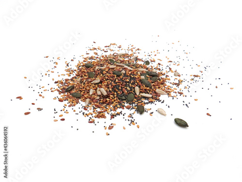 Bulk seed mix on white background. Variety of roasted seeds, flax, chia, pipe for healthy eating. Ecological and organic spices and food.