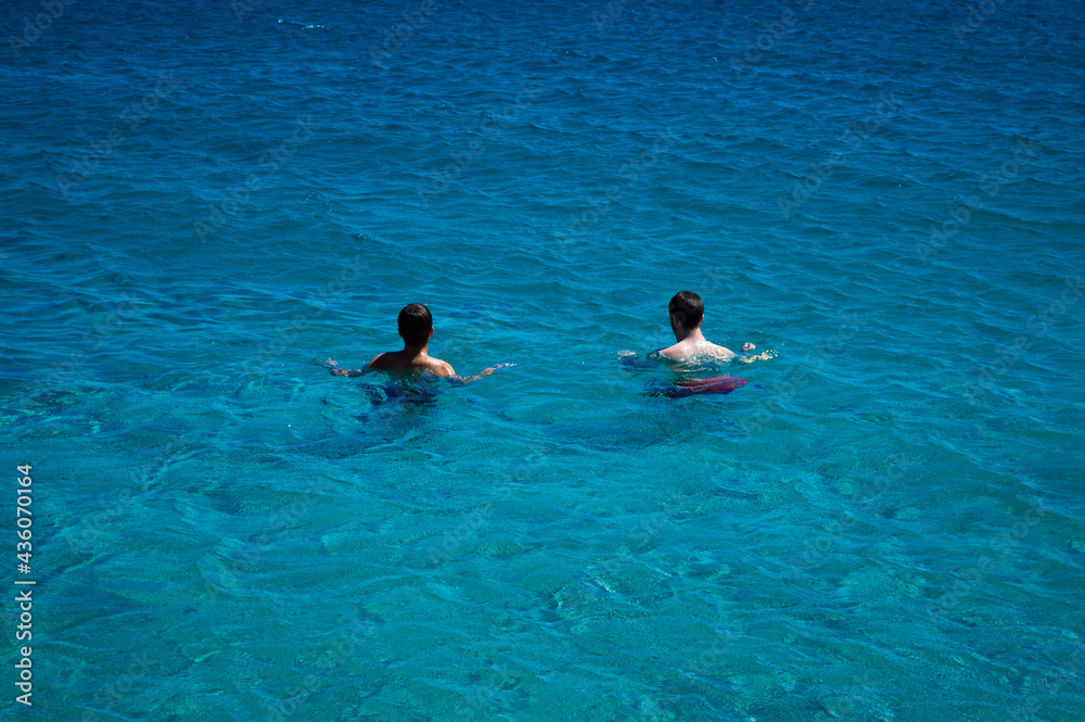 Swimming in the blue ocean