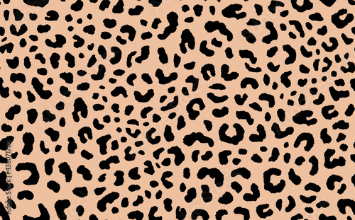 Abstract modern leopard seamless pattern. Animals trendy background. Beige and black decorative vector stock illustration for print, card, postcard, fabric, textile. Modern ornament of stylized skin photo