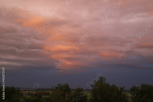 Fototapeta Naklejka Na Ścianę i Meble -  gloomy sky with relief colored clouds