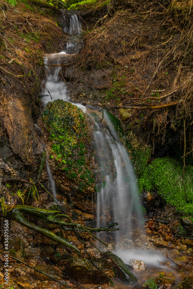Obraz premium Small waterfall near Lisci valley in spring color day