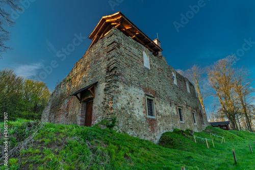 Januv castle over Vizovice town in fresh spring sunny morning photo