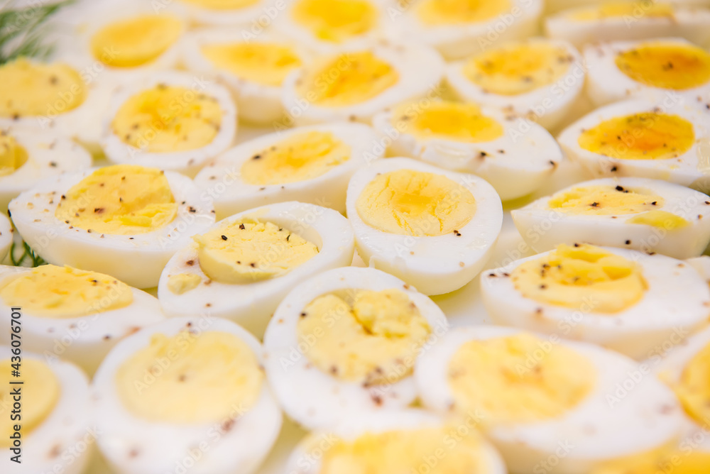 Sliced hard boiled eggs filling entire frame. Macro view Sliced hard boiled eggs filling entire frame. Macro view
