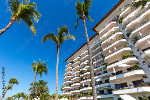 Luxury condominiums and apartments on Playa De Los Muertos beach and pier close to the famous Puerto Vallarta Malecon, the city largest public beach.