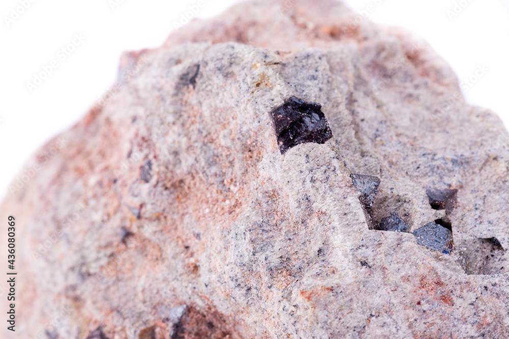 macro stone mineral magnetite on a white background macro stone mineral magnetite on a white background