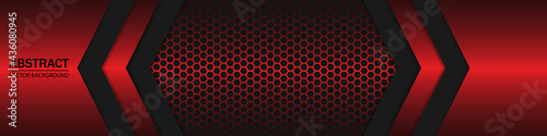 Red and black shapes, stripes and lines on a dark carbon fiber hexagonal background. Geometric shapes on a hexagonal red grid.