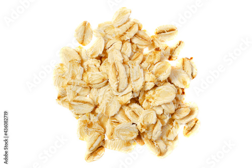 Pile of oat flakes isolated on a white background, top view. Oat flakes isolated on white background, top view. Heap of oatmeal isolated on white background. Rye flakes isolated on white, top view.