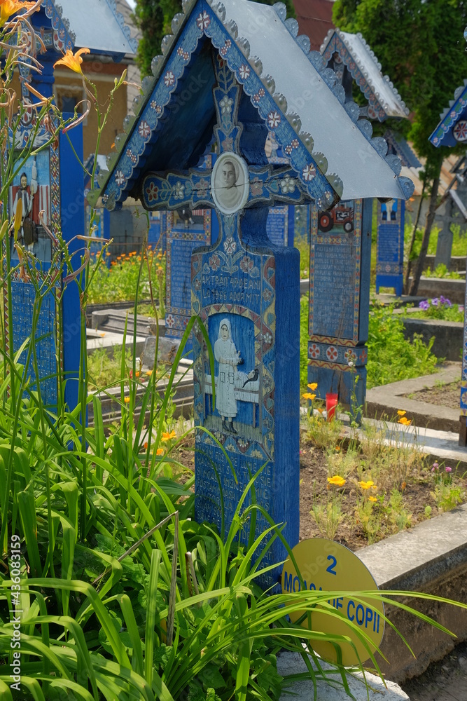 The Merry Cemetery is a cemetery in the village of Sapanta, Maramures county, Romania. In the Merry Cemetery, grave markers celebrate life with beautiful images and gentle wit.