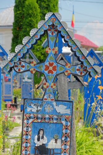 The Merry Cemetery is a cemetery in the village of Sapanta, Maramures county, Romania. In the Merry Cemetery, grave markers celebrate life with beautiful images and gentle wit.