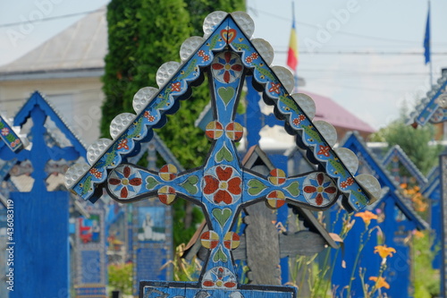 The Merry Cemetery is a cemetery in the village of Sapanta, Maramures county, Romania. In the Merry Cemetery, grave markers celebrate life with beautiful images and gentle wit.