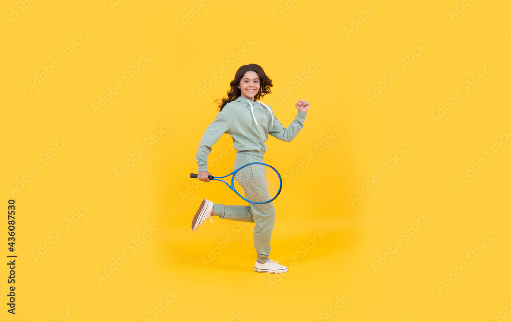 tennis or badminton player. healthy and active lifestyle. sport success. happy childhood.