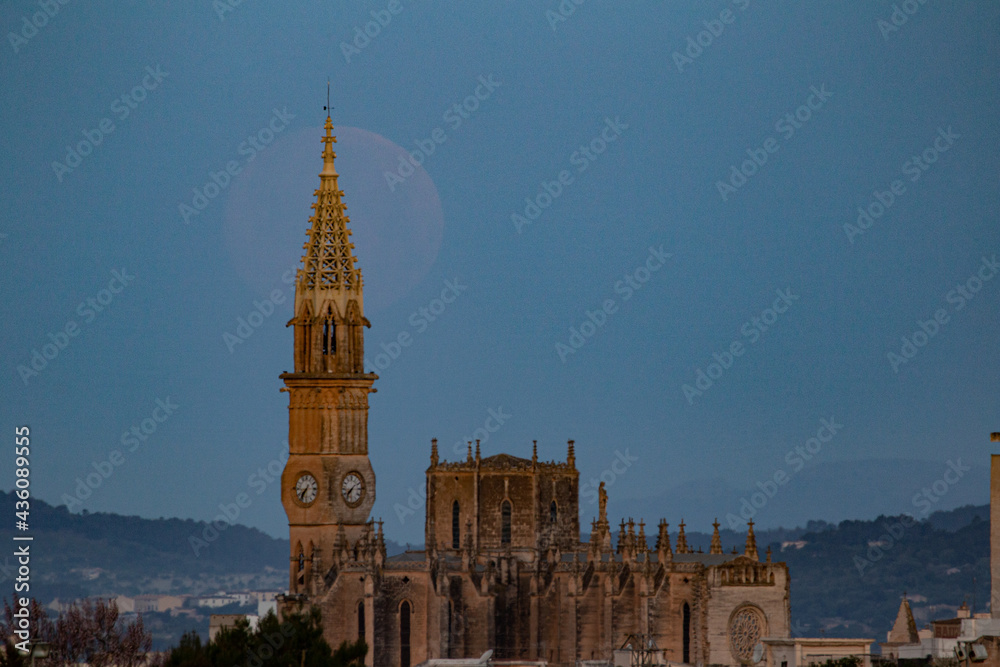 moonset behind the catholic church in Mallorca