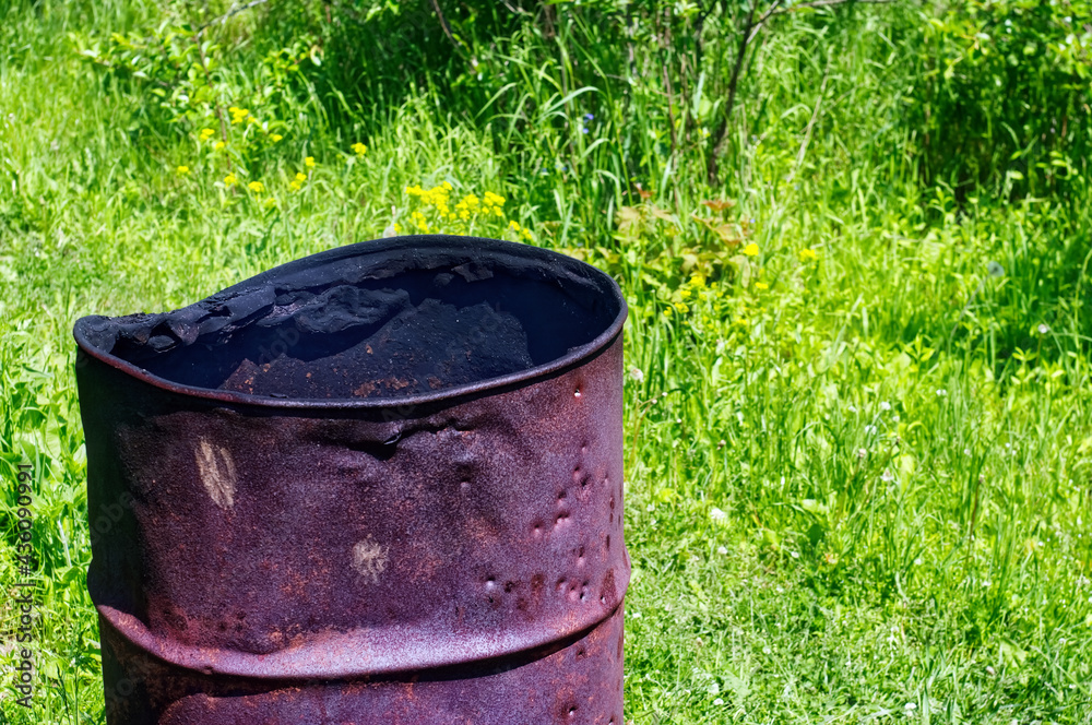 iron barrel for burning garbage in the garden iron barrel for burning garbage in the garden