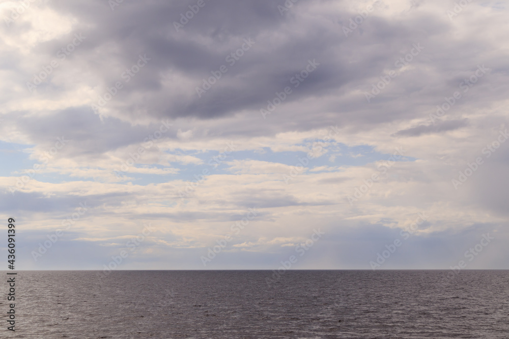 Cloudy skies above the sea