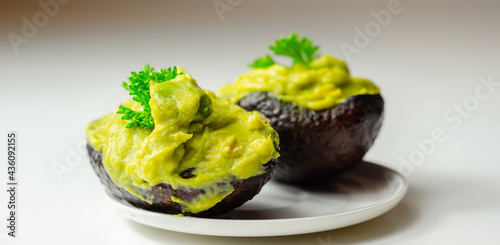 Smashed avocado,  smother avocado with lemon juice served on the for brunch