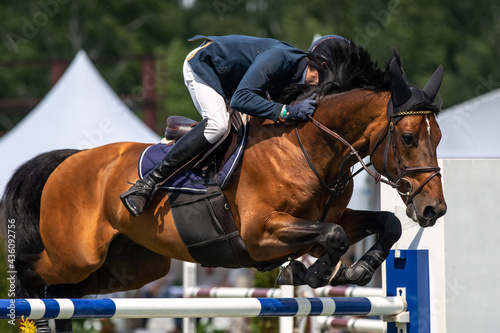 Horse Jumping, Equestrian Sports, Show Jumping themed photo. Fototapeta