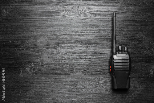 Walkie talkie radio station on the black flat lay background with copy space. photo