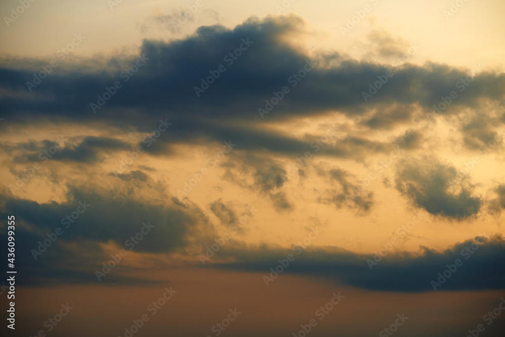 beautiful sunset sky, dark silhouette of clouds as a background beautiful sunset sky, dark silhouette of clouds as a background
