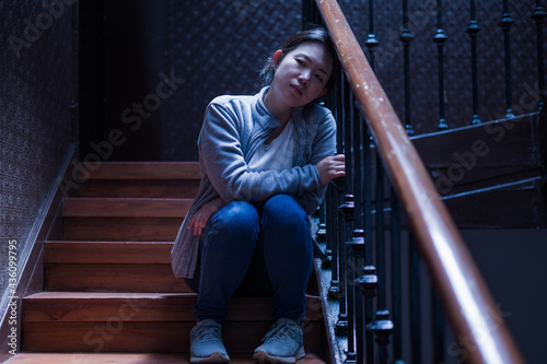 young beautiful Asian woman in pain suffering depression - drama