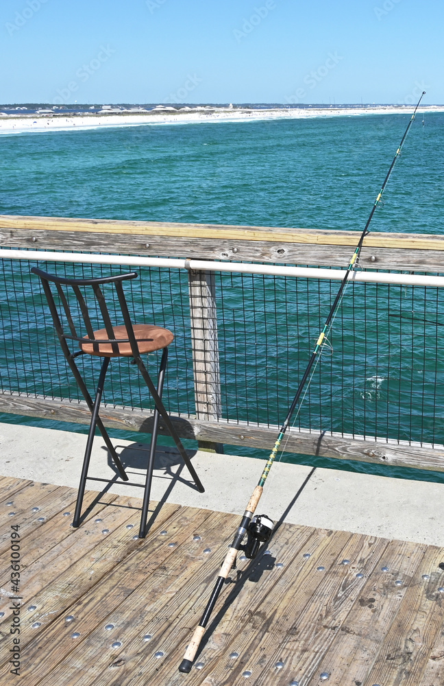 Fishing Pole and Stool on Pier
