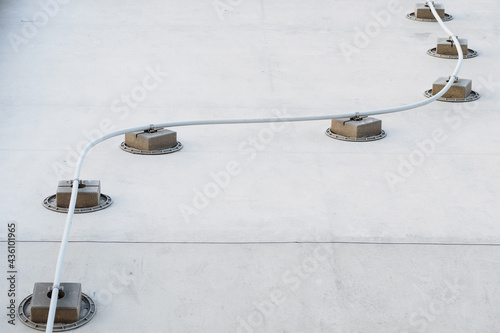Fotografija Lightning conductor on a concrete footing.