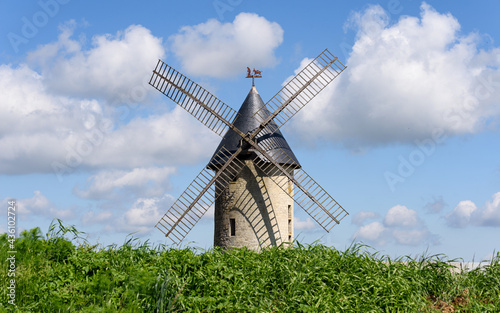The old windmill of Largny-sur-Automne aka "Moulin de Wallu" (in french) on a sunny day, located in Aisne department, France. Formerly used to grind cereal grain into flour, mainly wheat.
