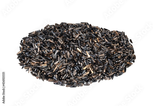 pile of niger seeds (Guizotia Abyssinica) on white photo