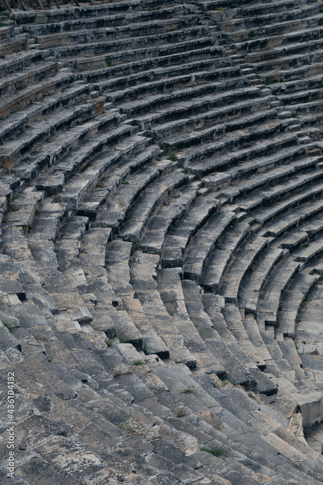 Ancient Roman amphitheater made of stone under the open sky in Pamukkale in Turkey Ancient Roman amphitheater made of stone under the open sky in Pamukkale in Turkey