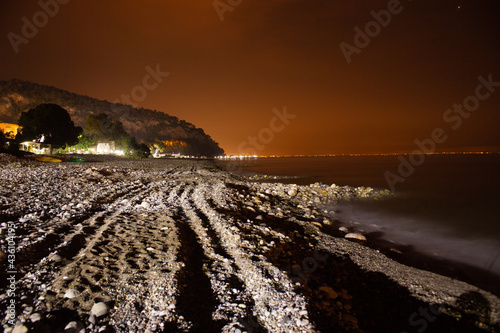 Beach at night in beldibi town kemer turkey photo