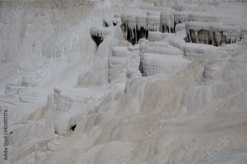 Carbonate mineral left by the flowing of thermal spring calcite-laden waters in Pamukkale © Hennadii