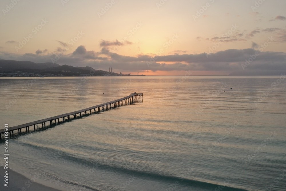 Fototapeta premium Salida de sol en pto Alcudia. drone view. mallorca Spain best sandy beaches . Sunrisevibes