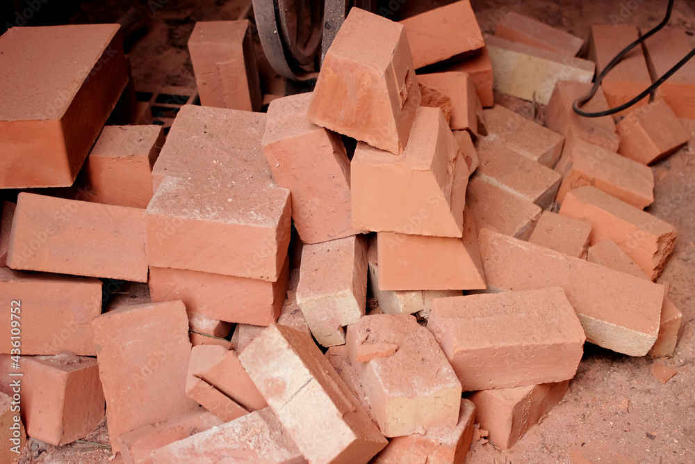 Construction of fireplaces and stoves. Red brick stove construction. Brick building tools Construction of fireplaces and stoves. Red brick stove construction. Brick building tools