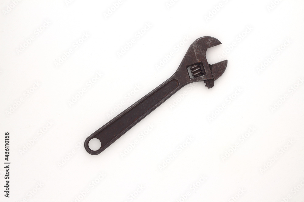 Old rusty Adjustable Wrench on white background. Old rusty Adjustable Wrench on white background.