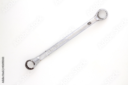Stainless steel wrench isolated on white background. Top view. © bt1976