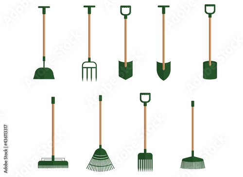 A set of garden tools from several shovels and different rakes