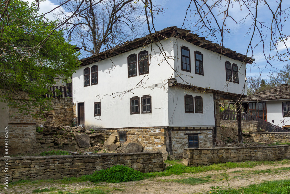 Typical street and old houses at historical village of Bozhentsi, Bulgaria