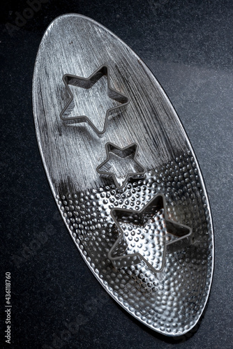 Oval silver textured plate for garnish.