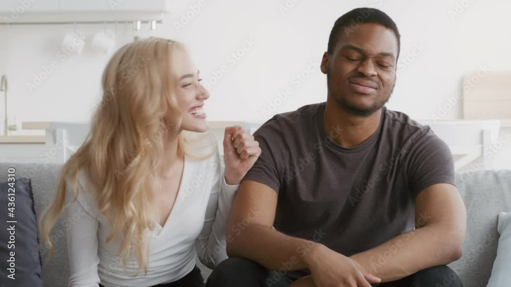 Diverse Couple Playing Videogame Having Fun Sitting At Home Diverse Couple Playing Videogame Having Fun Sitting At Home